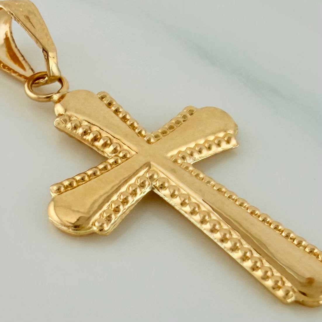 Dije Cruz 0.9gr / 1 1/4 in / Oro Amarillo 18K %