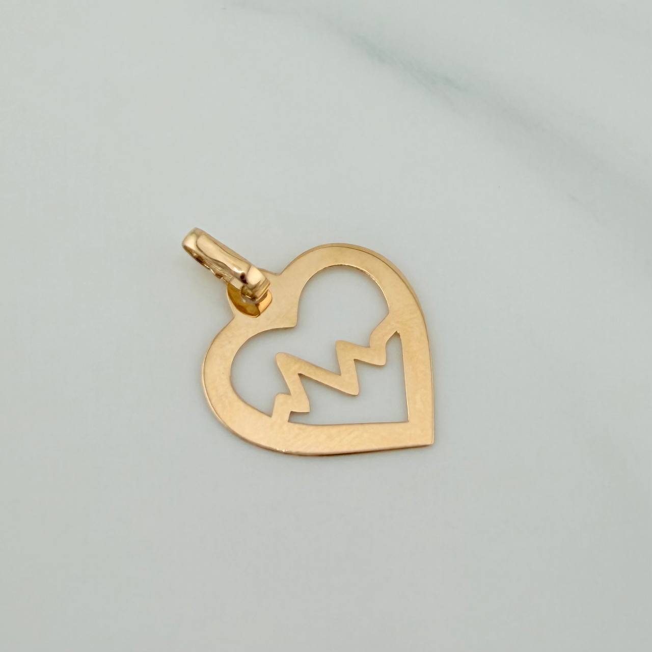 Dije Silueta Corazón 0.45gr / 3/4 in / Oro Amarillo 18K &