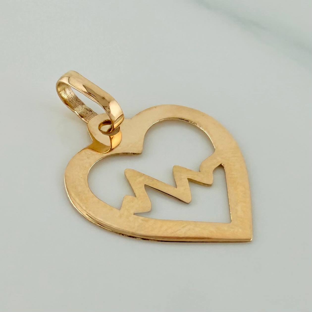 Dije Silueta Corazón 0.45gr / 3/4 in / Oro Amarillo 18K &