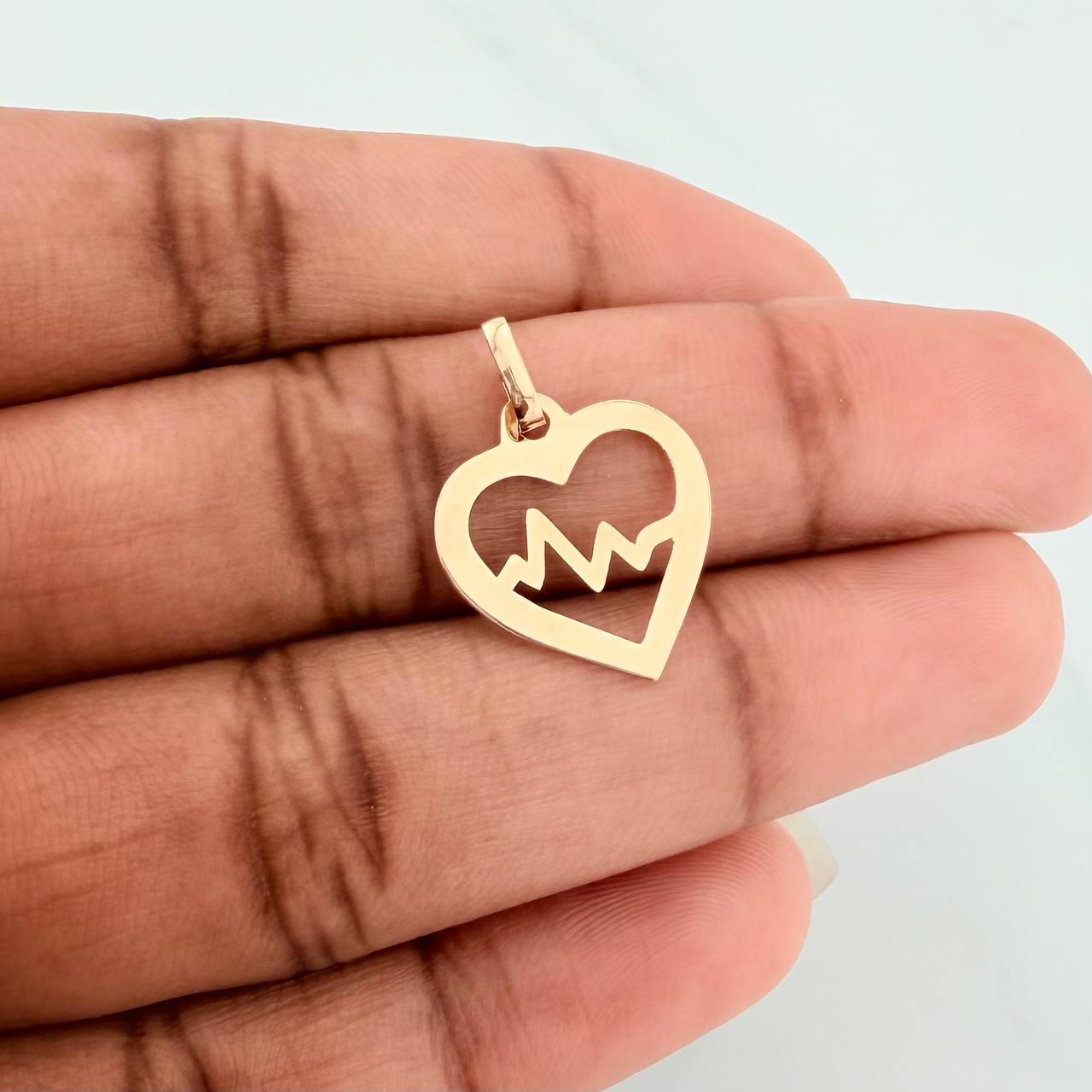 Dije Silueta Corazón 0.45gr / 3/4 in / Oro Amarillo 18K %