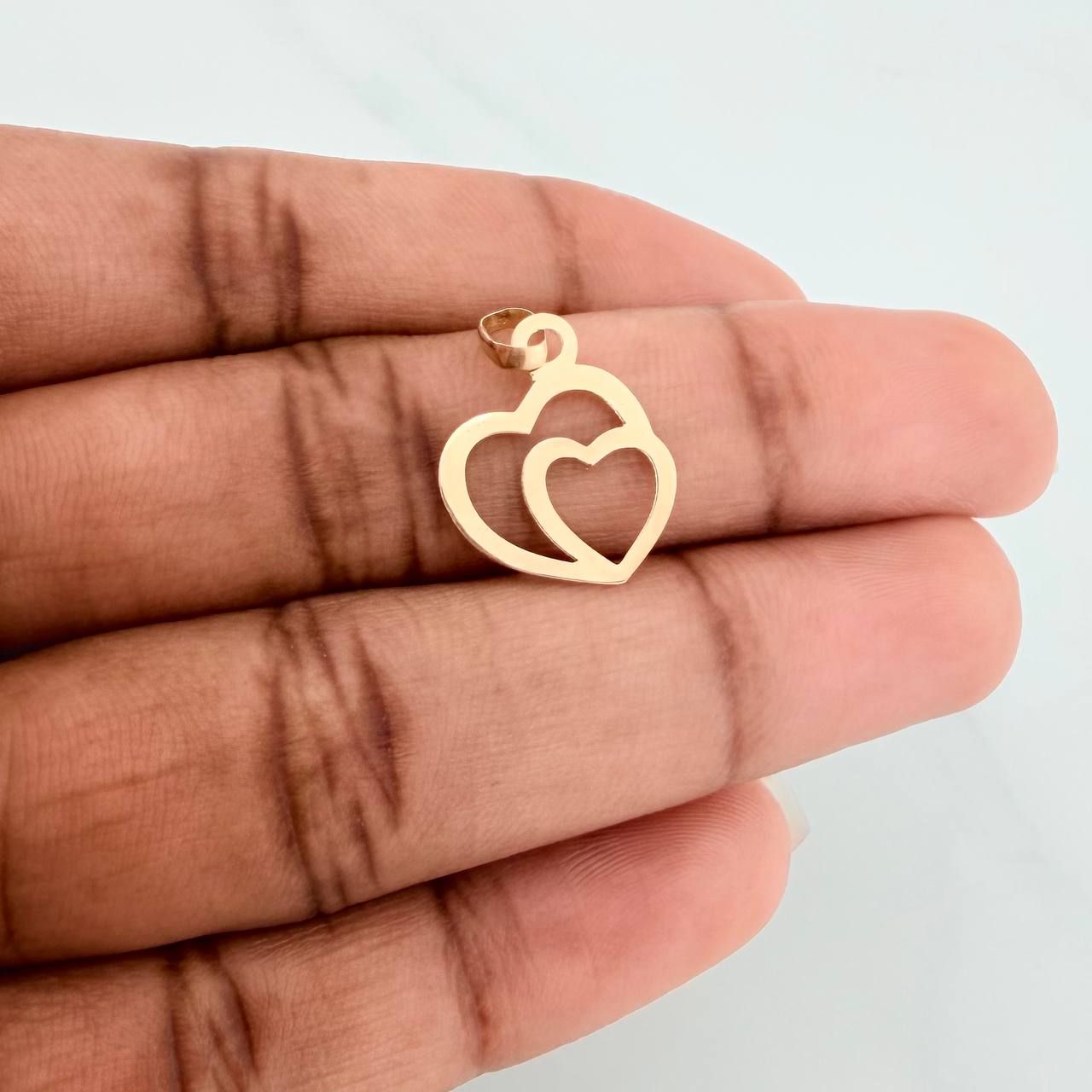 Dije Silueta Corazón Doble 0.4gr / 3/4 in / Oro Amarillo 18K &