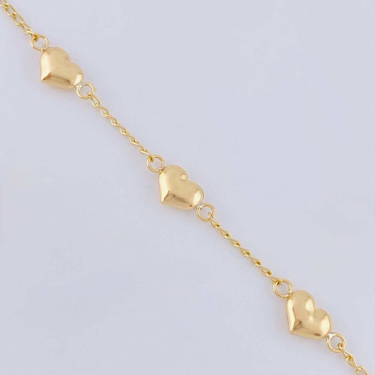 Bracelet Espiga Trio of Hearts 2.05 g / 7 1/2 in / 1.6 mm Yellow Gold 18K