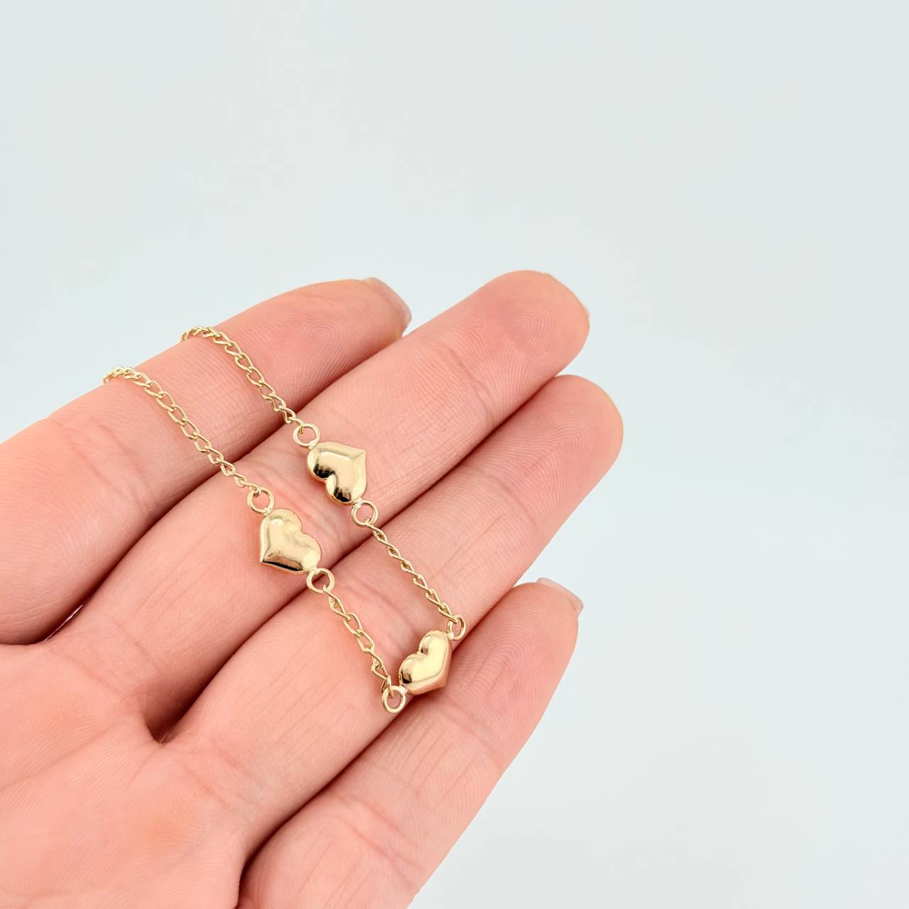 Bracelet Espiga Trio of Hearts 2.05 g / 7 1/2 in / 1.6 mm Yellow Gold 18K