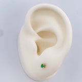 Topos Cuatro Garras Esmeralda 0.85gr / Oro Amarillo 18K &