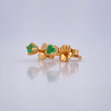 Topos Cuatro Garras Esmeralda 0.75gr / Oro Amarillo 18K $