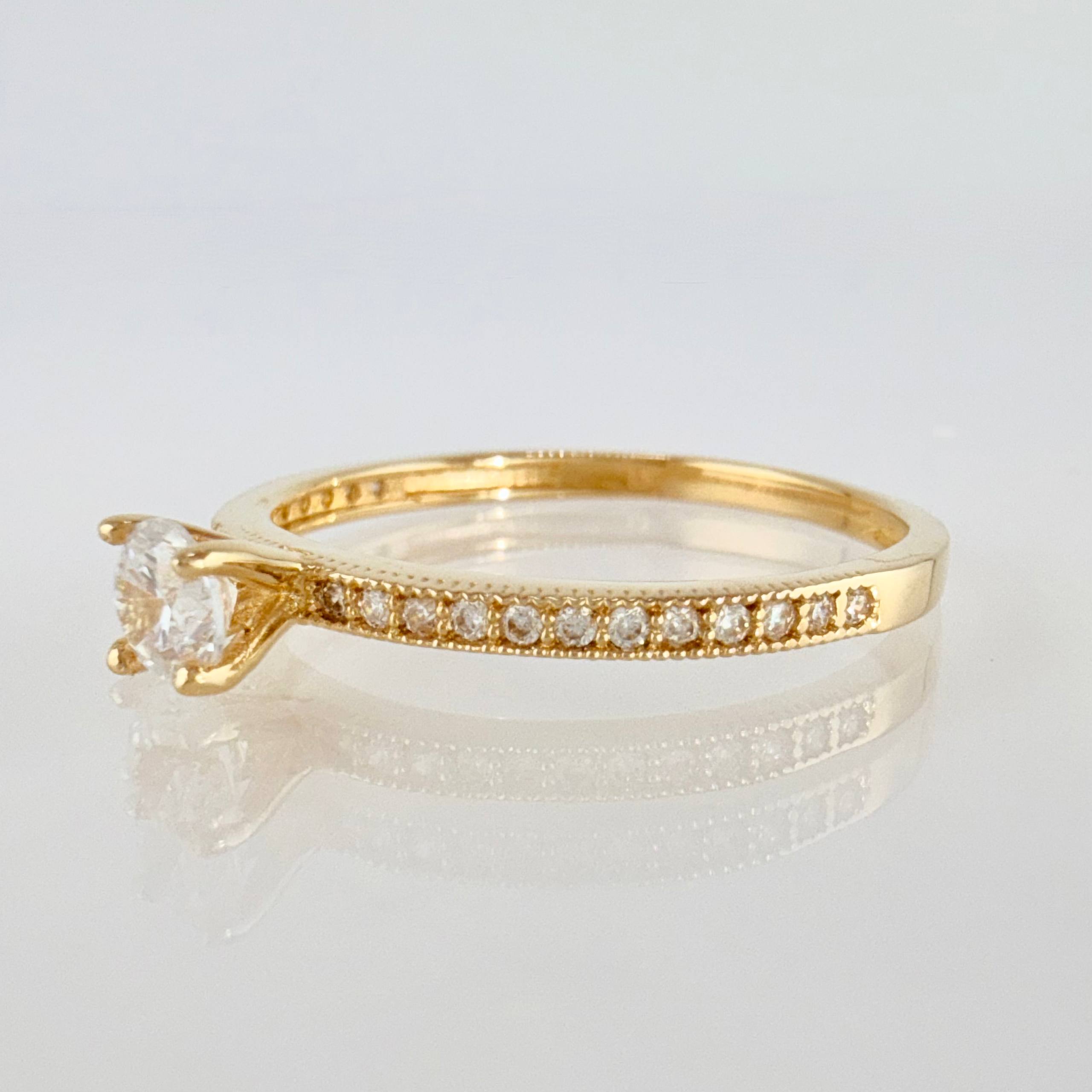 Anillo Solitario Bordeado 1.55gr / T7 3/4 / Oro Amarillo 18K ©