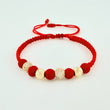 Pulsera Tejida Roja Bolas de Fuego Bolas Diamantadas Oro Amarillo 18K