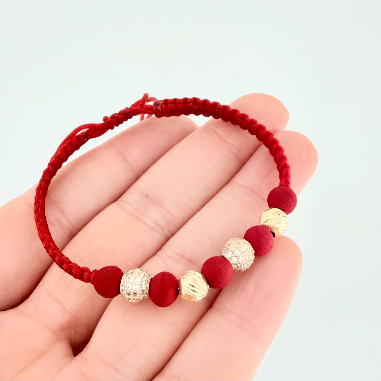 Pulsera Tejida Roja Bolas de Fuego Bolas Diamantadas Oro Amarillo 18K