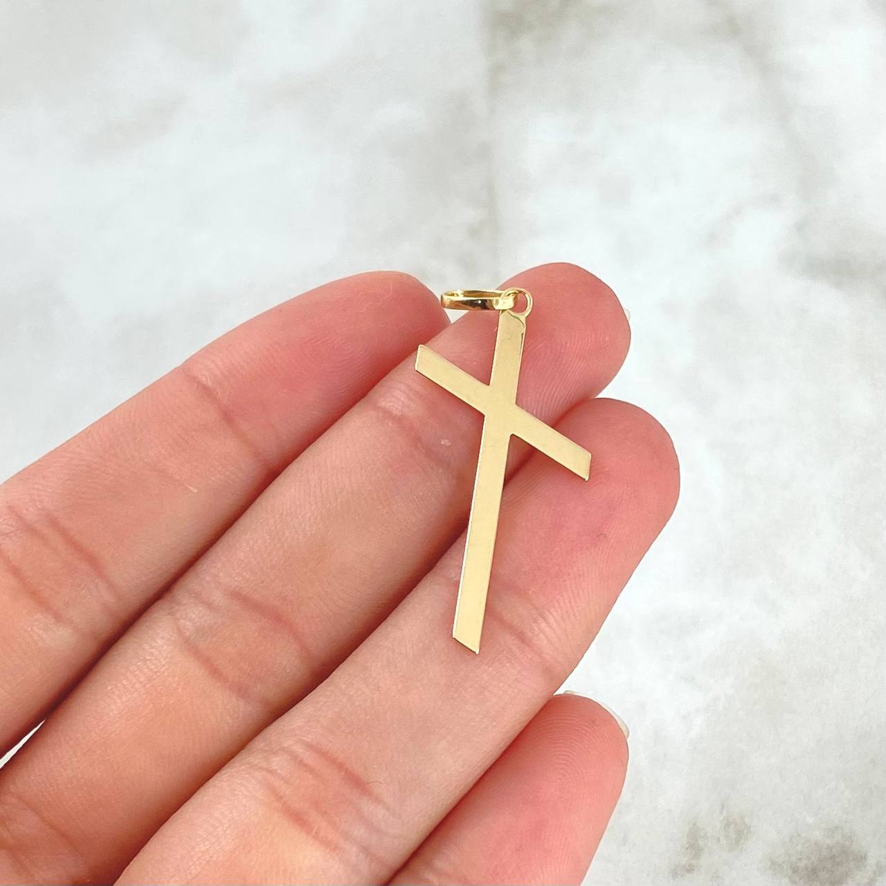 Dije Cruz Diagonal Plana 0.85gr / 3.8cm / Oro Amarillo 18K *