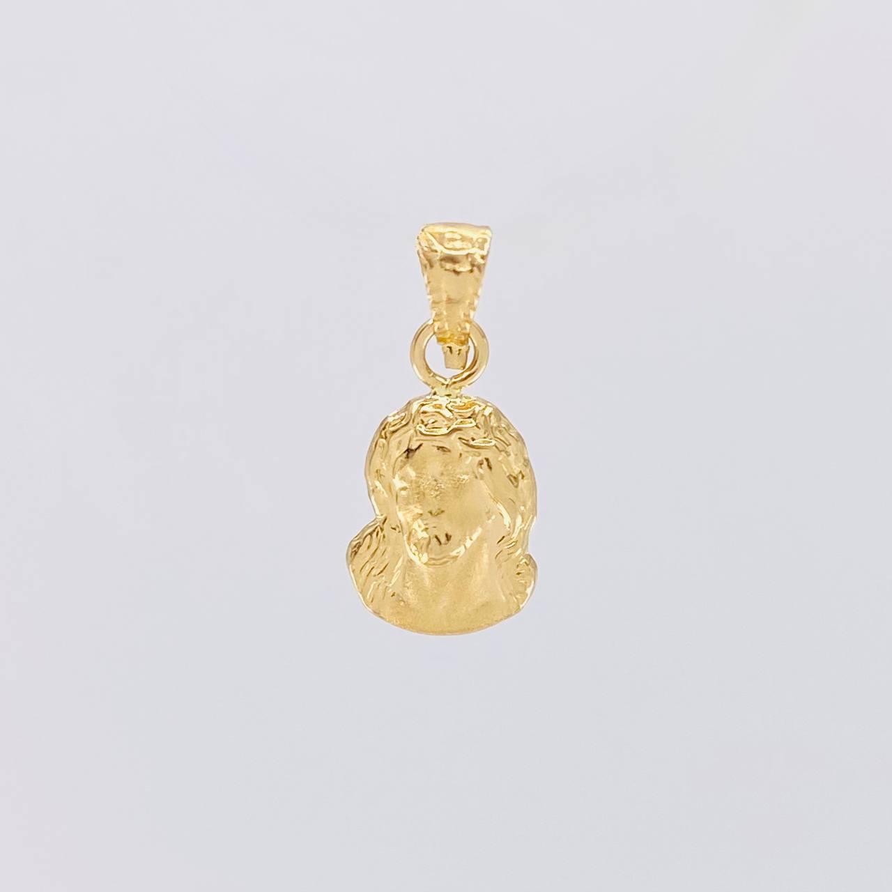 Dije Rostro de Cristo 0.35g / 1/2 in Oro Amarillo 18K