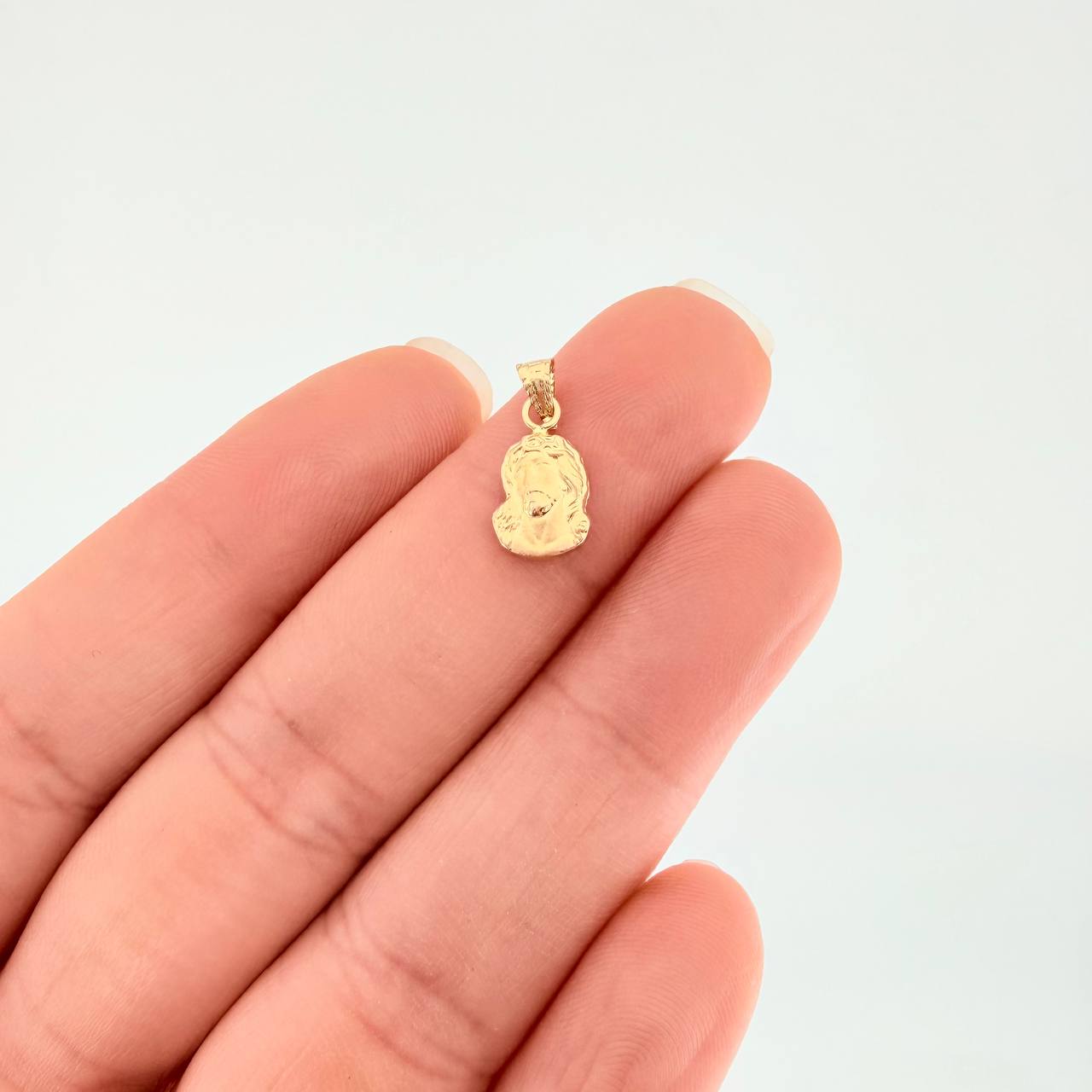 Dije Rostro de Cristo 0.35g / 1/2 in Oro Amarillo 18K