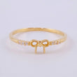 Anillo Moño 1.15 g / T7 1/2 Oro Amarillo 18K