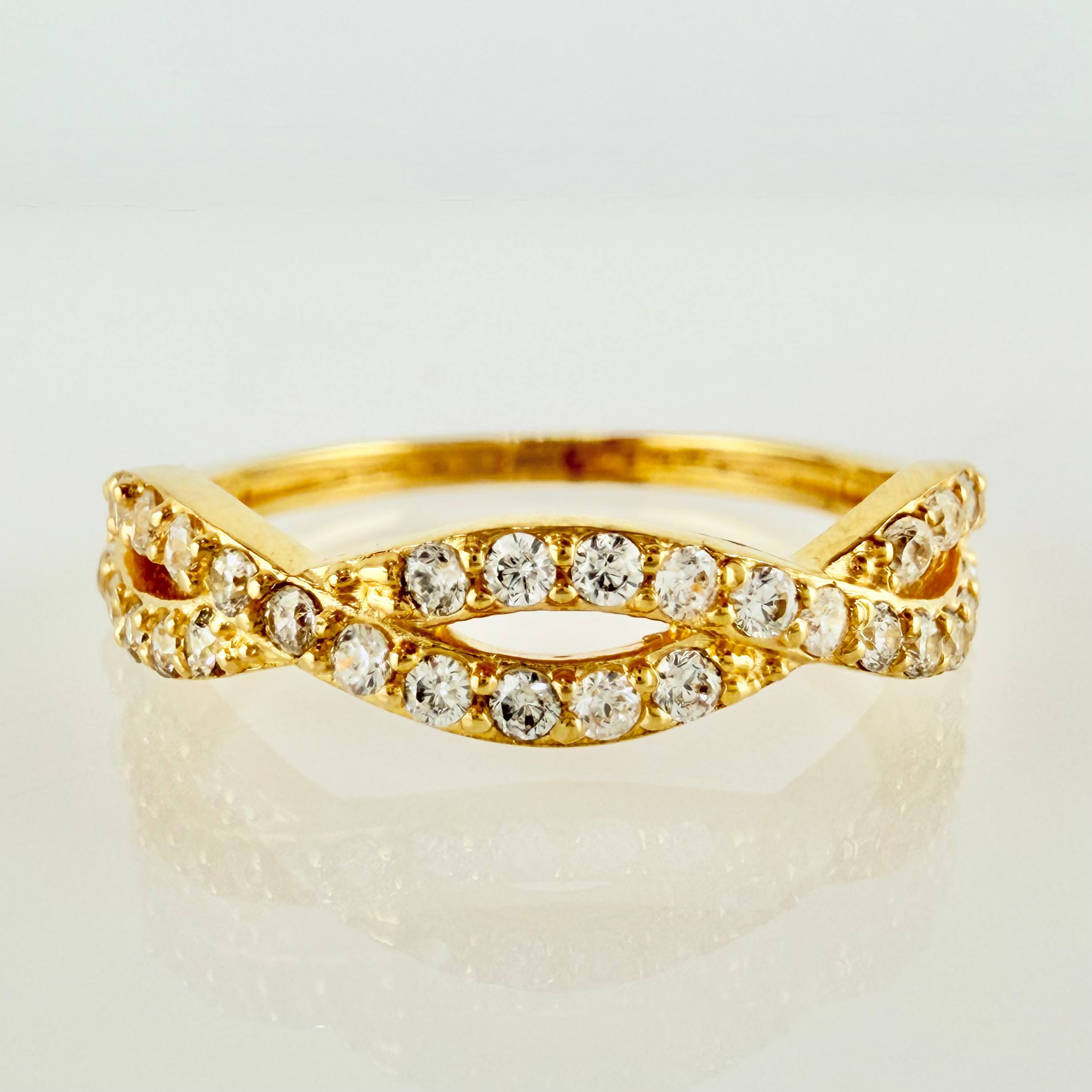 Anillo Carriles Entrelazados 1.85gr / T7 / Oro Amarillo 18K