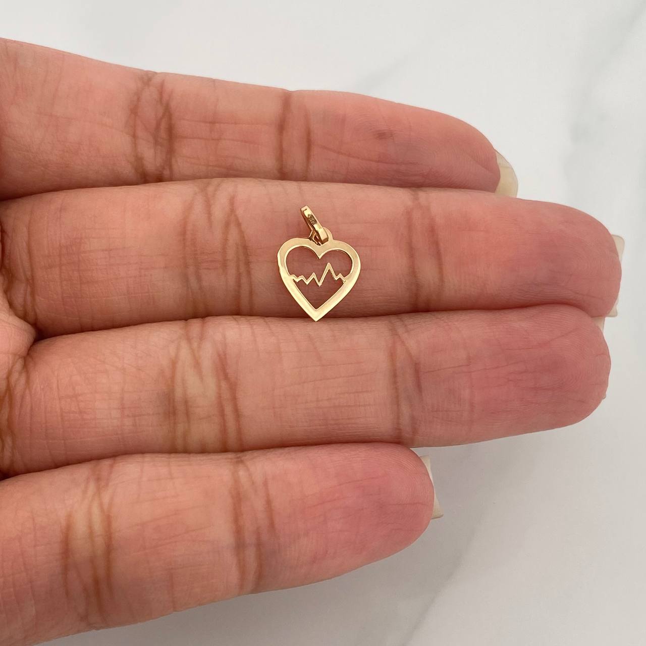 Dije Silueta Corazón 0.25gr / 1/2 in / Oro Amarillo 18K %