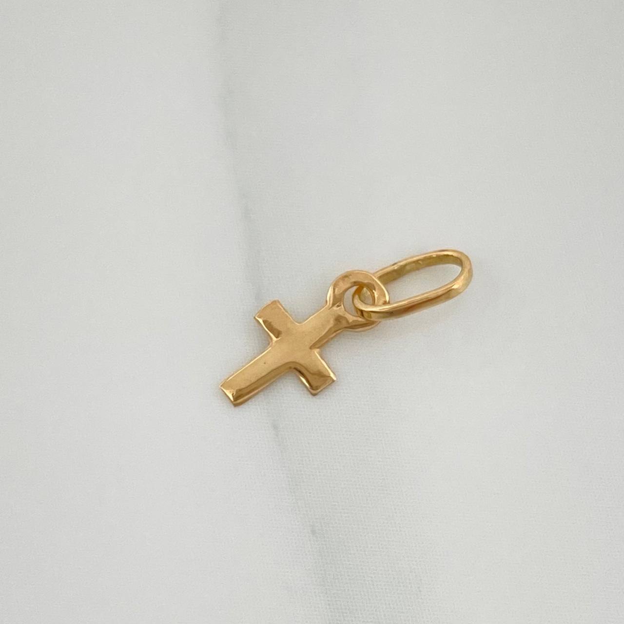 Dije Cruz 0.15gr / 1/2 in / Oro Amarillo 18K %