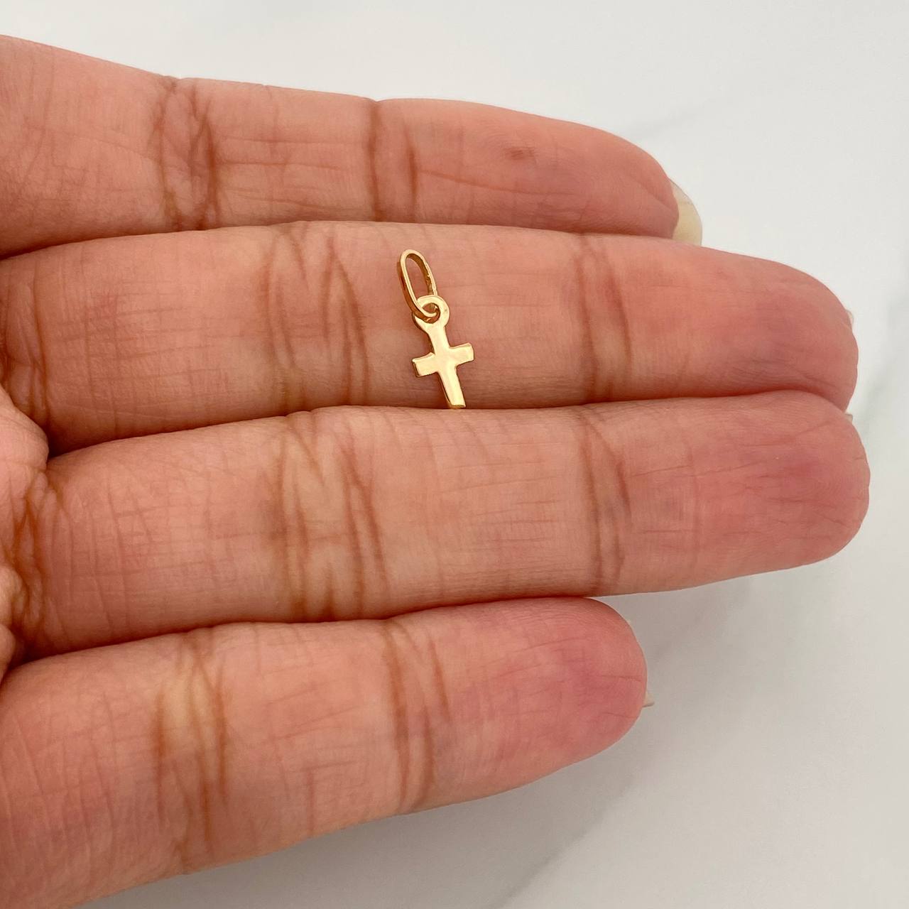 Dije Cruz 0.15gr / 1/2 in / Oro Amarillo 18K %