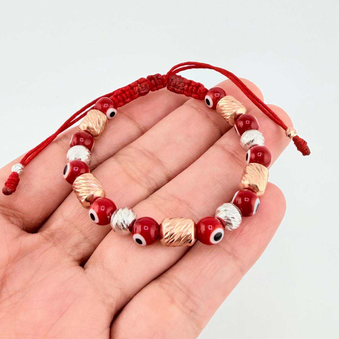 Woven Bracelet with Turkish Eye Cylinders 6mm Two Golds White Rose 18K