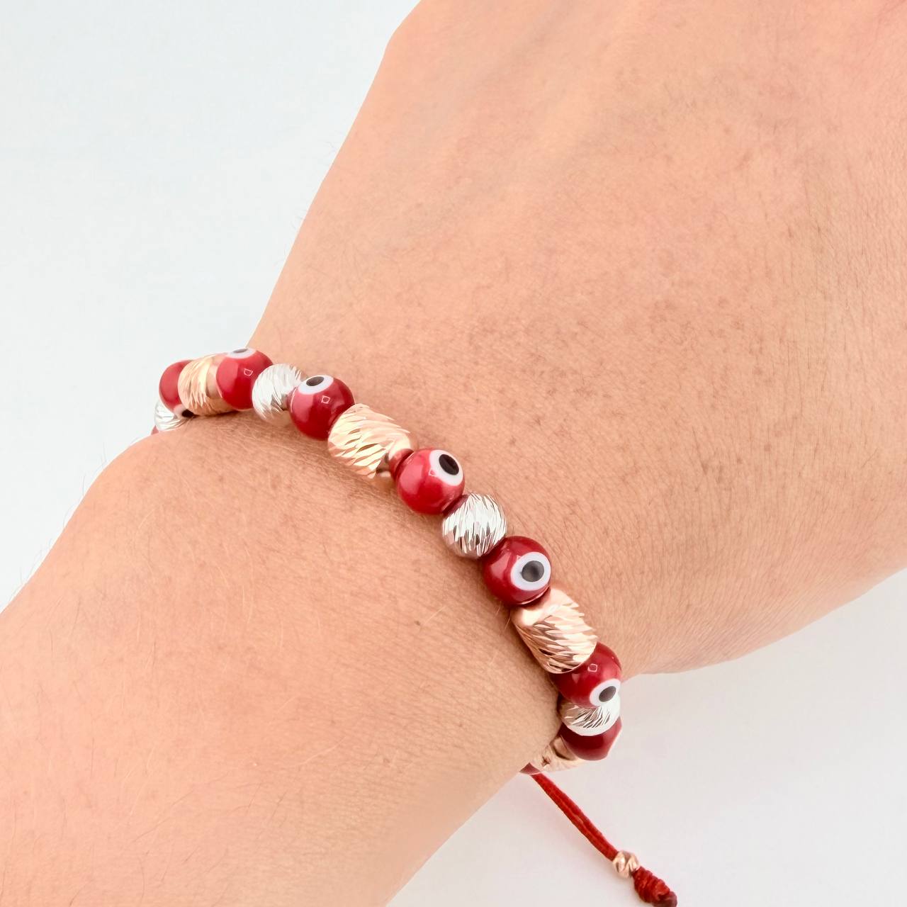 Woven Bracelet with Turkish Eye Cylinders 6mm Two Golds White Rose 18K