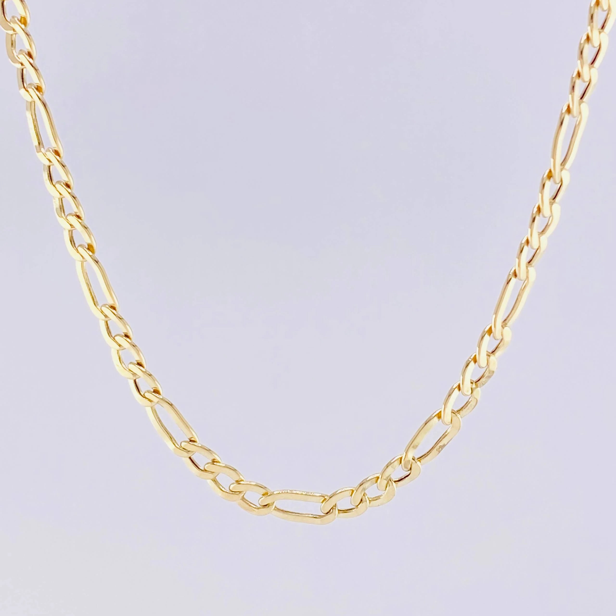 Cadena Figaro 7.4g / 24 in / 4mm Oro Amarillo 18K
