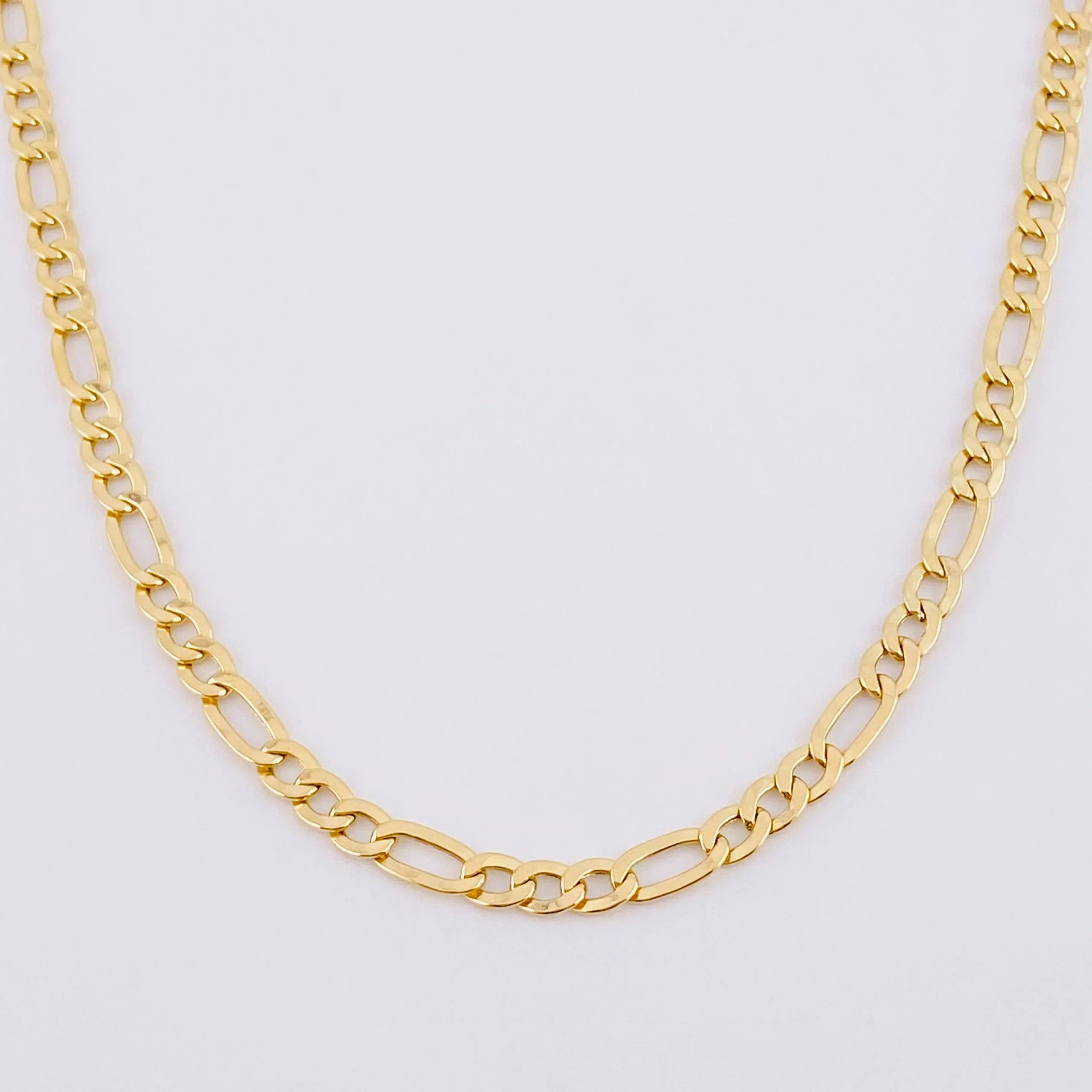 Cadena Figaro 7.4g / 24 in / 4mm Oro Amarillo 18K