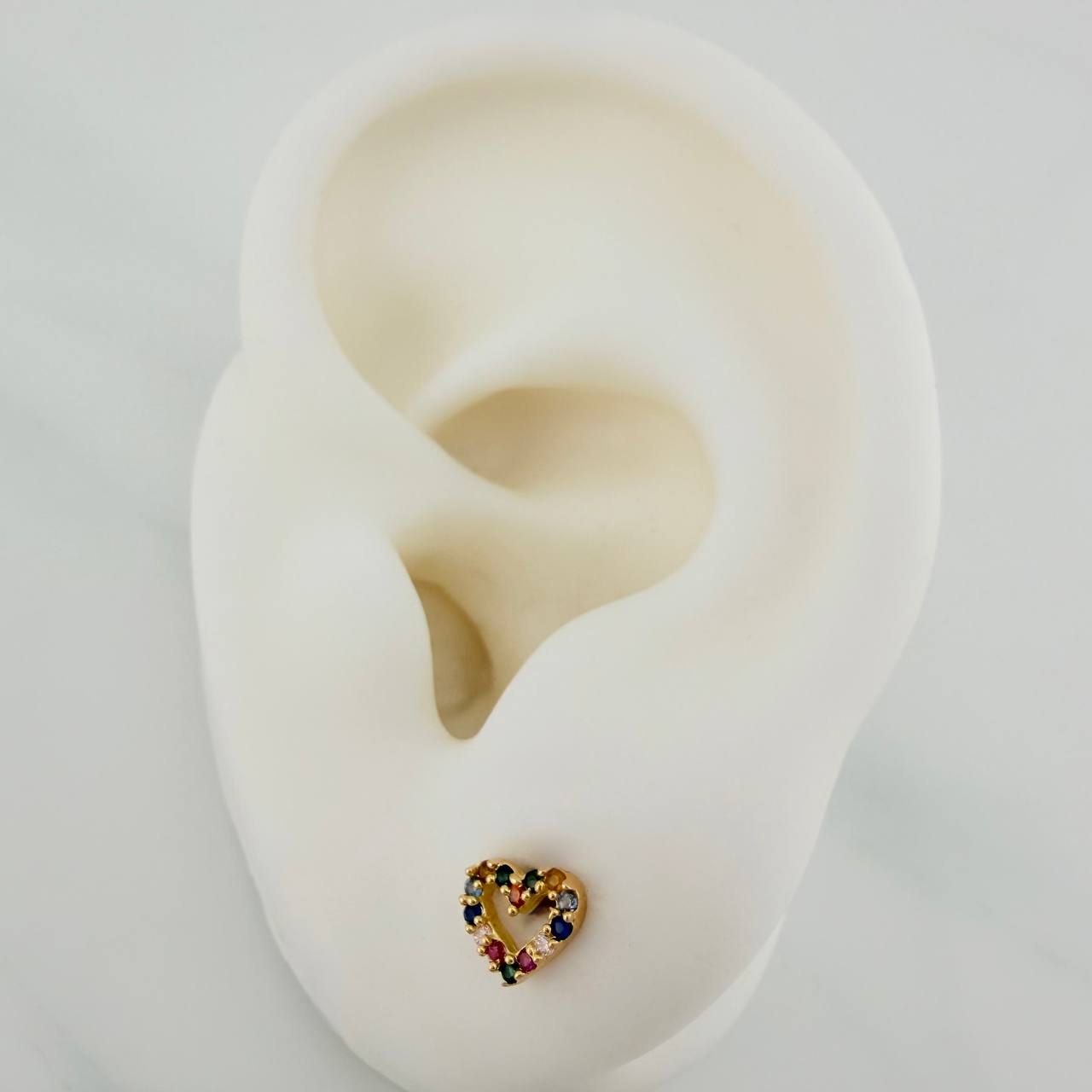 Topos Silueta Corazón 0.8gr / 6.2mm Oro Amarillo 18K %