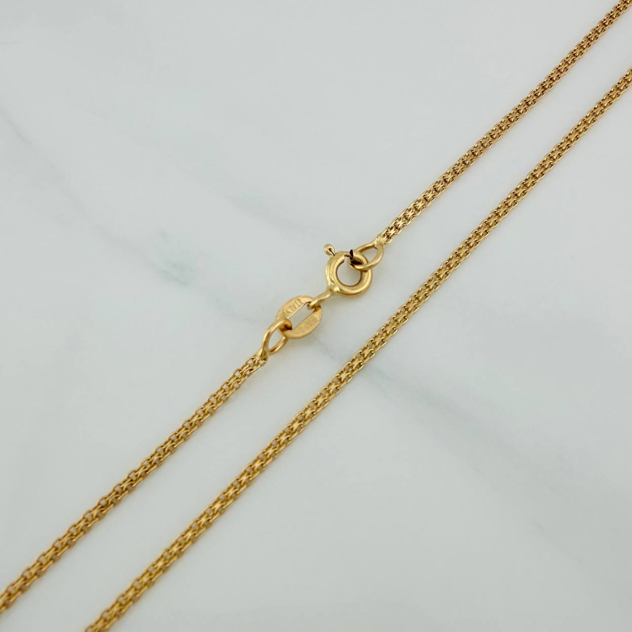 Cadena China 3.15gr / 23 1/2 in / 1.4mm Oro Amarillo +3 18K $