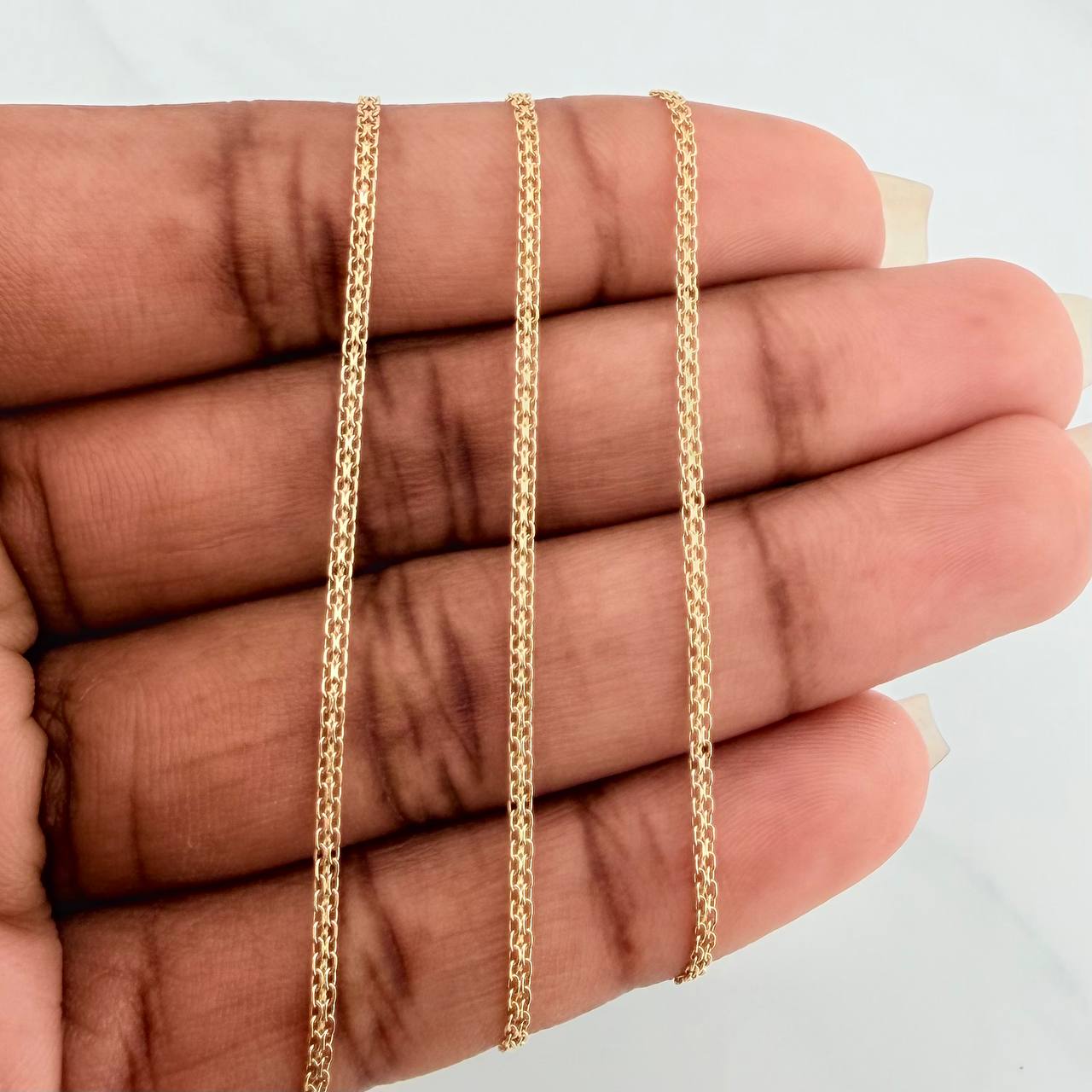 Cadena China 3.15gr / 23 1/2 in / 1.4mm Oro Amarillo +3 18K $