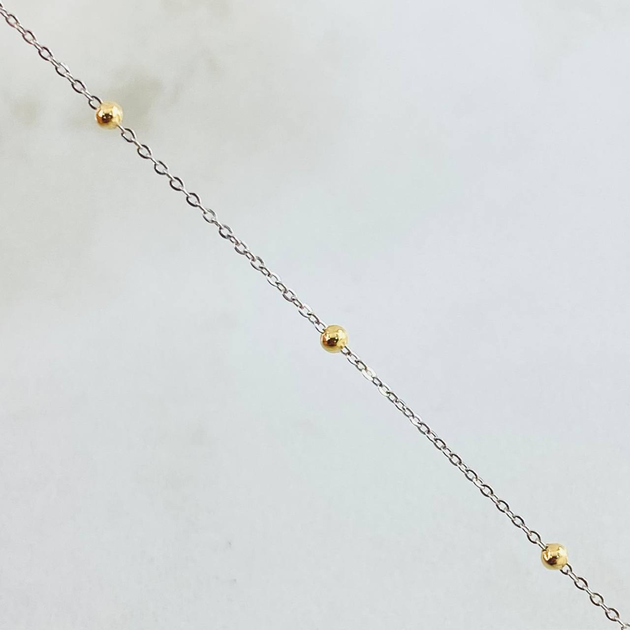 Cadena Aro Seguido Bolas 1.15gr / 17 3/4 in / Dos Oros Amarillo Blanco +3 18K