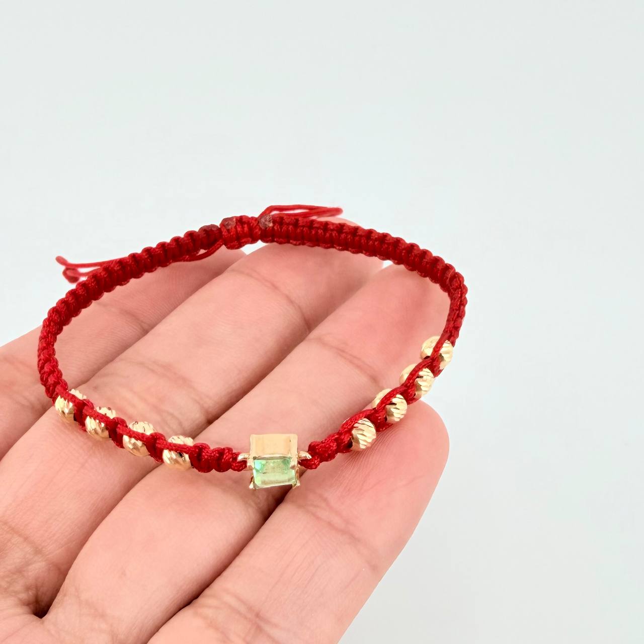 Red Woven Bracelet 8 4mm Beads Emerald Cube 28pts Yellow Gold 18K