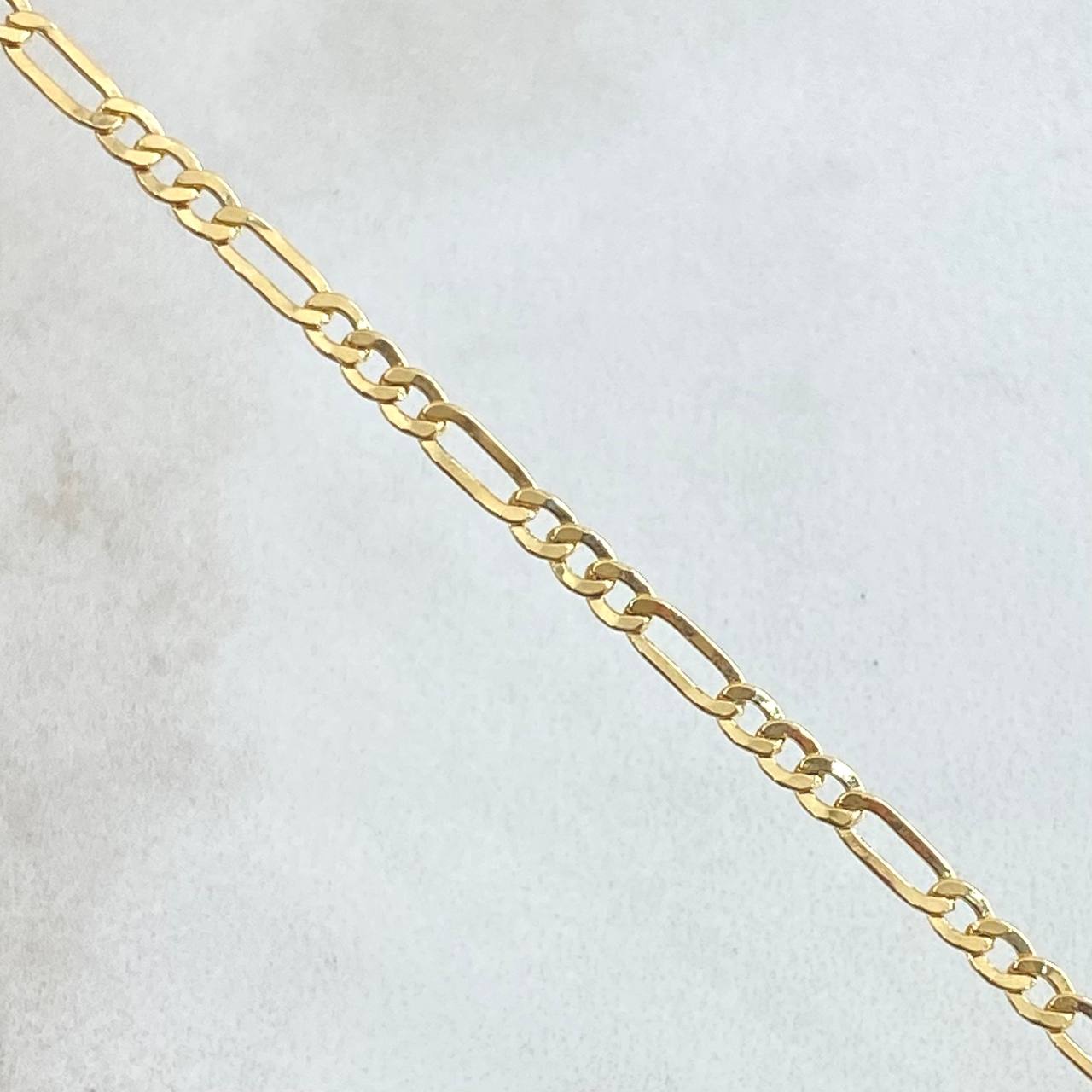 Cadena Figaro 2.75gr / 45cm / +1 Oro 18K ©