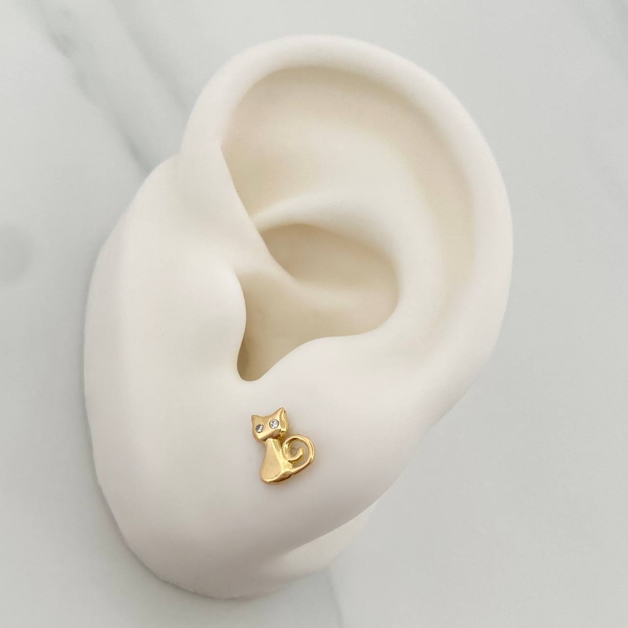 Topos Gato 0.95gr / 5.9mm Oro Amarillo 18K %