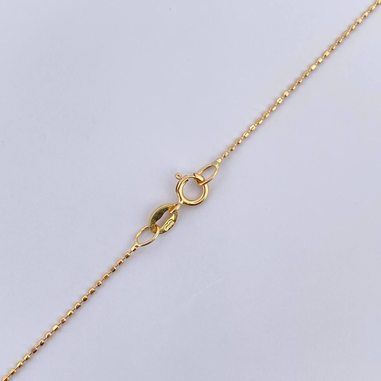Set Cadena Militar /1.35gr/45cm/0.6mm + Dije Divino Niño/0.5gr/2.0cm Troquelado  Oro 18K &