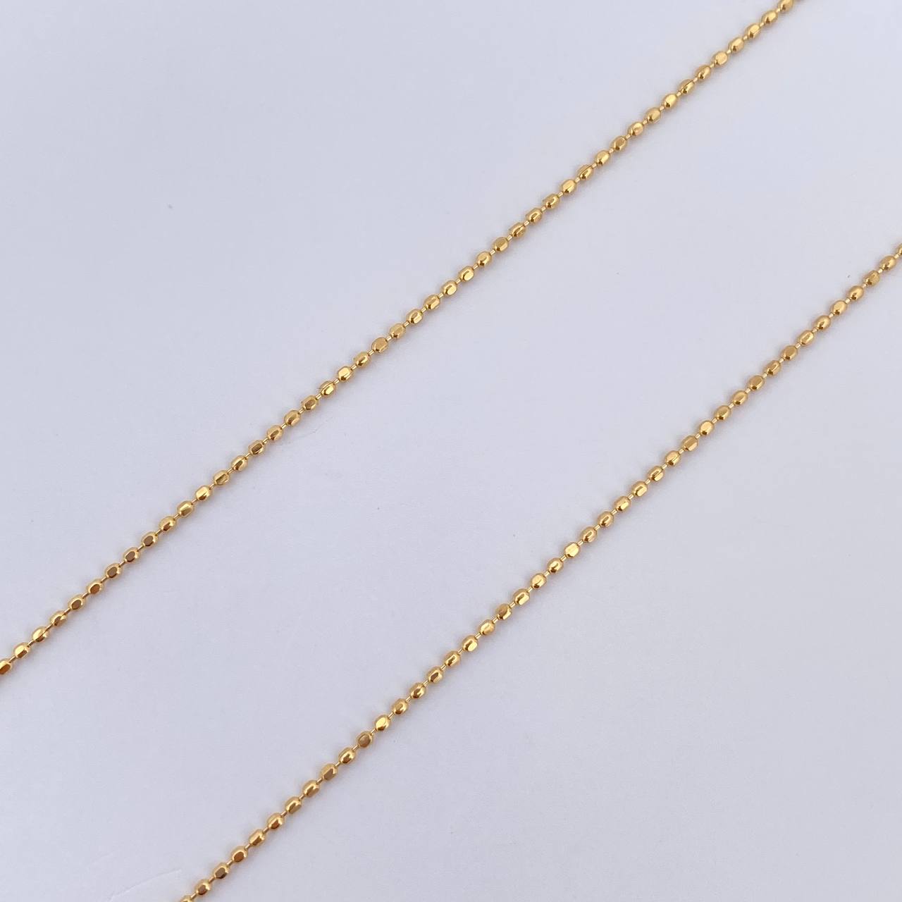 Set Cadena Militar /1.35gr/45cm/0.6mm + Dije Divino Niño/0.5gr/2.0cm Troquelado  Oro 18K &