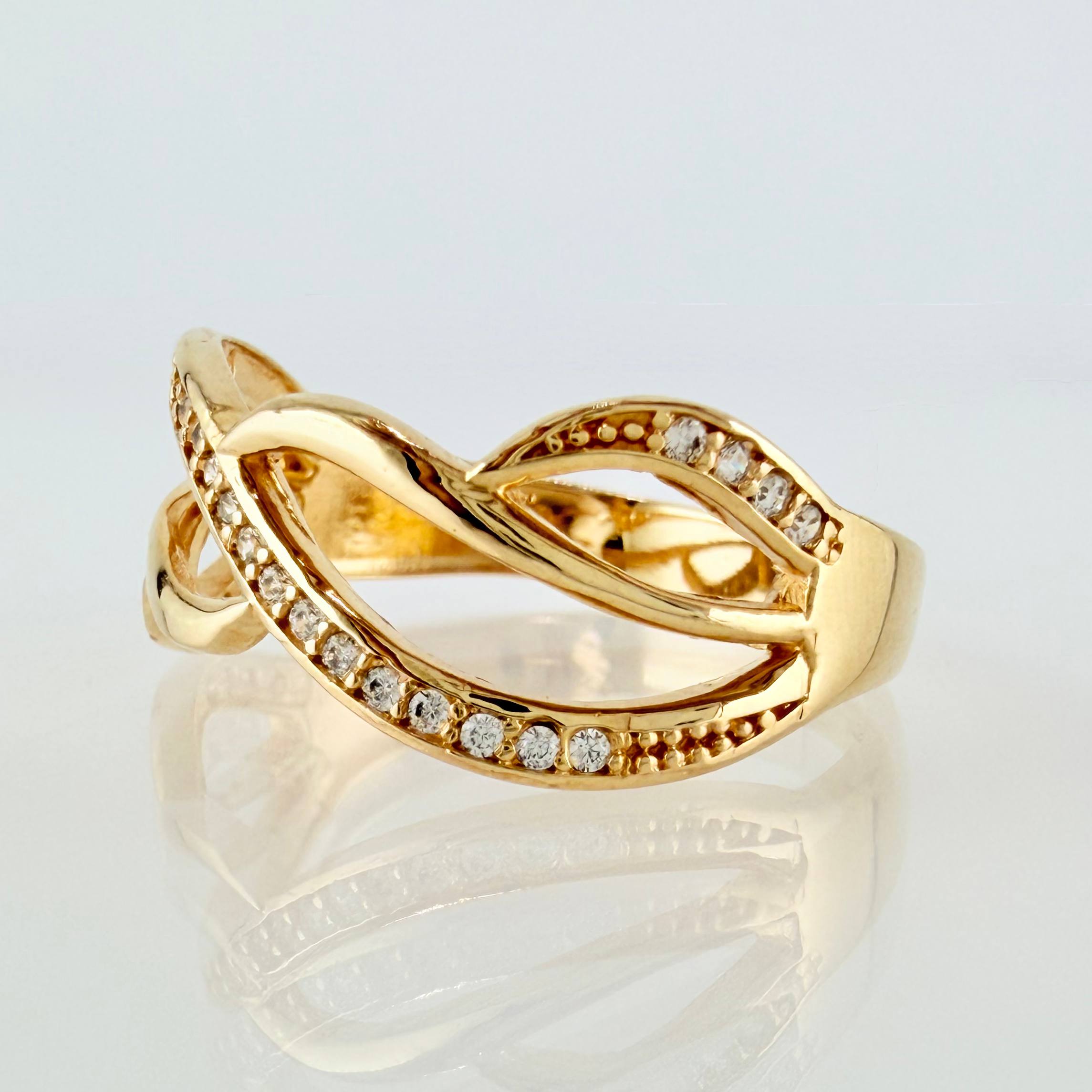 Anillo Carriles Entrelazados 3.2gr / T8 1/4 / Oro Amarillo 18K ©