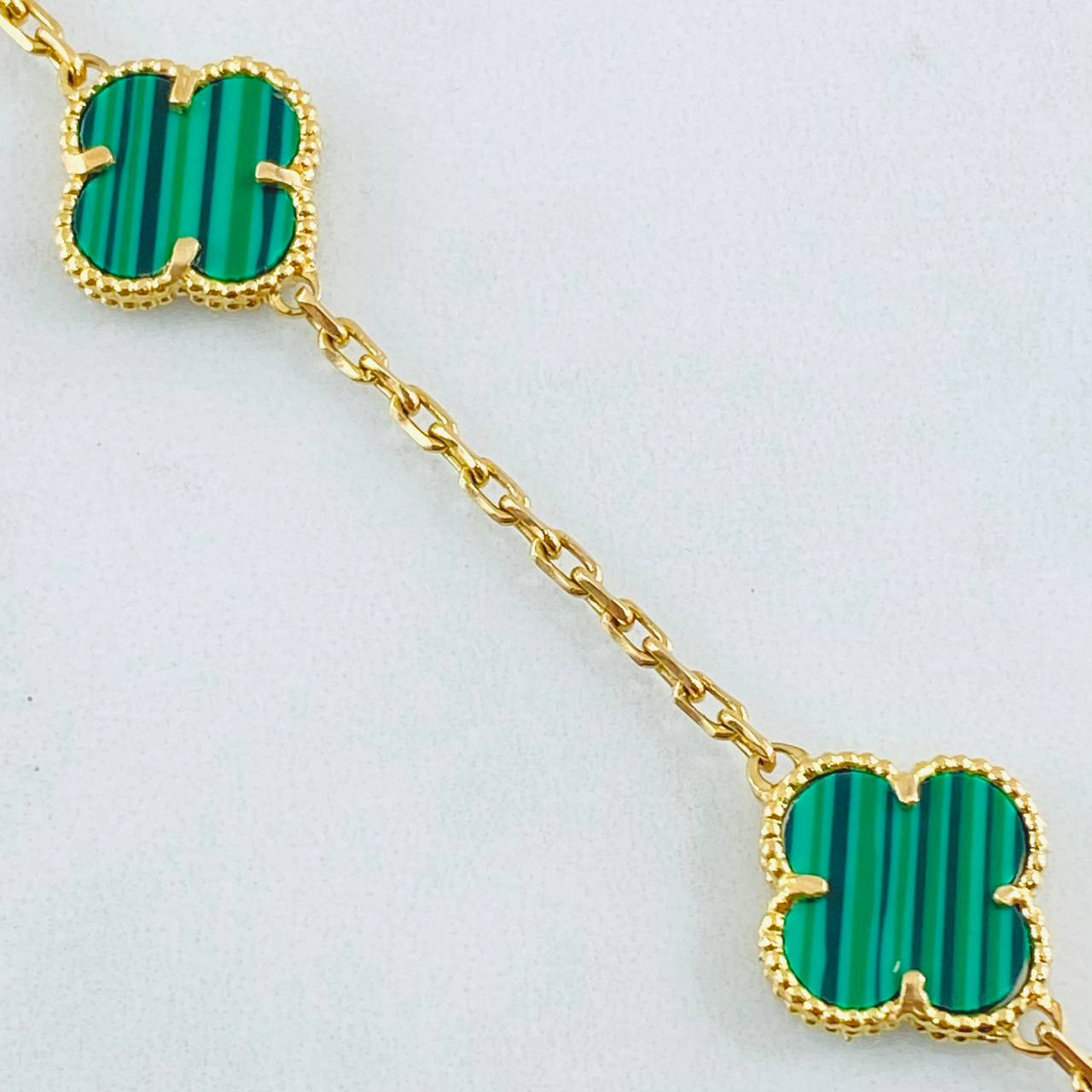 Cadena Aro seguido Trebol Verde 27.8gr / 23 1/2 in / Oro Amarillo Nac.Esp. 18K ©