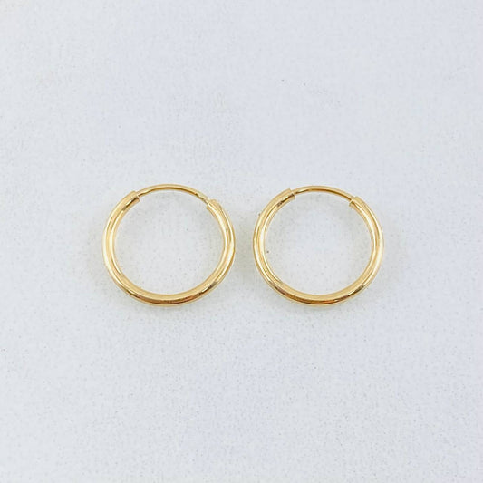 Candongas Aro Liso 0.55 g / 1/2 in Oro Amarillo 18K