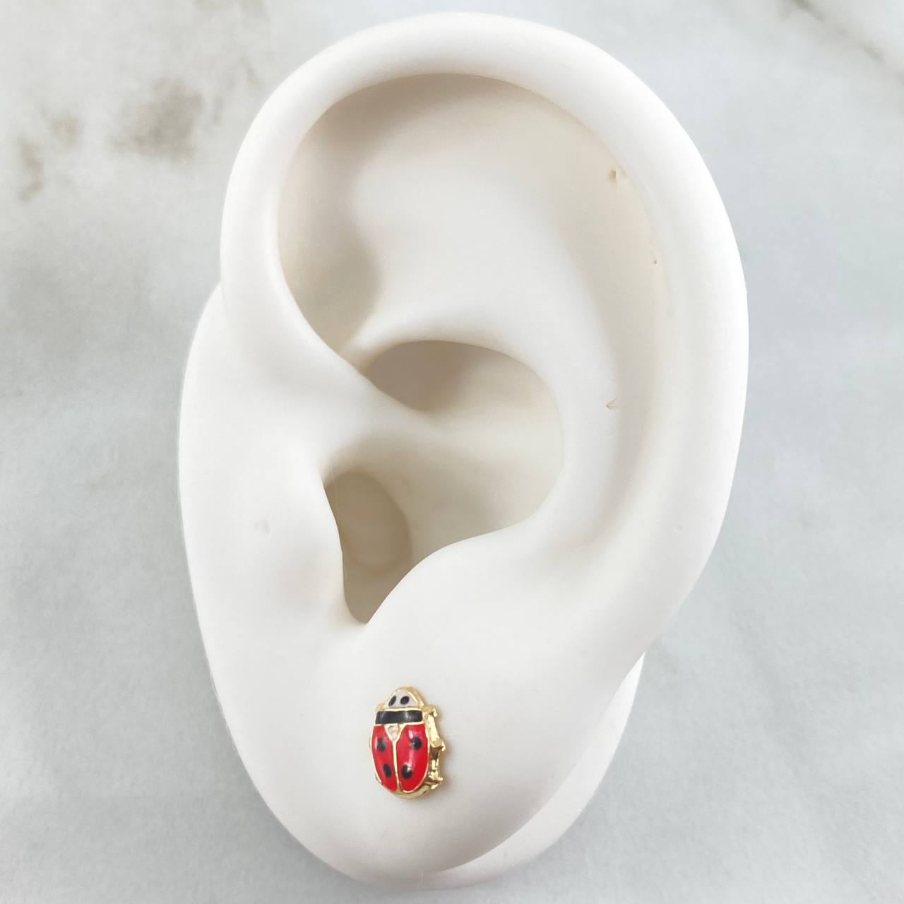 Topos Mariquita 0.65gr / 7mm Oro Amarillo 18K