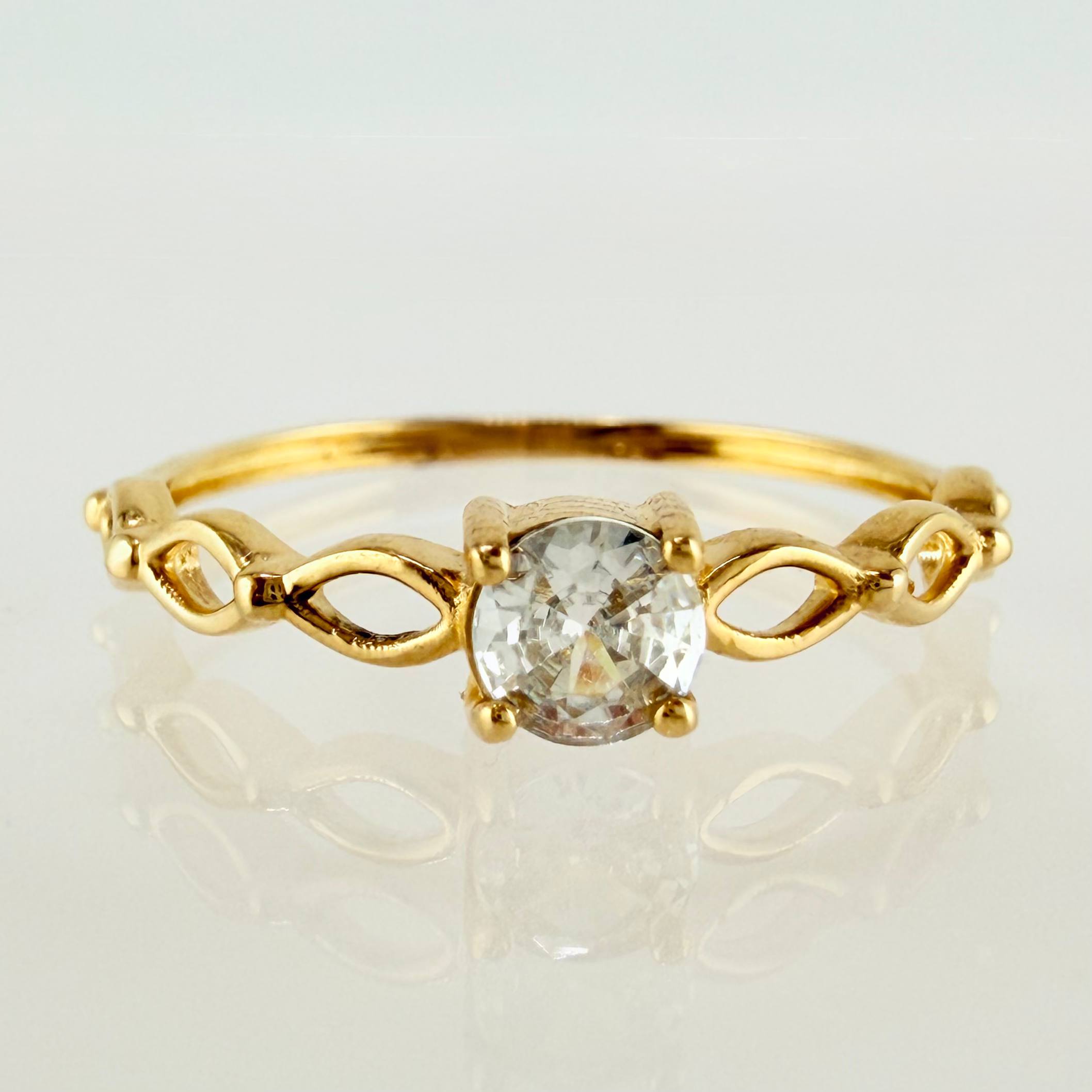 Anillo Solitario Ojos 1.15gr / T5 / Oro Amarillo 18K