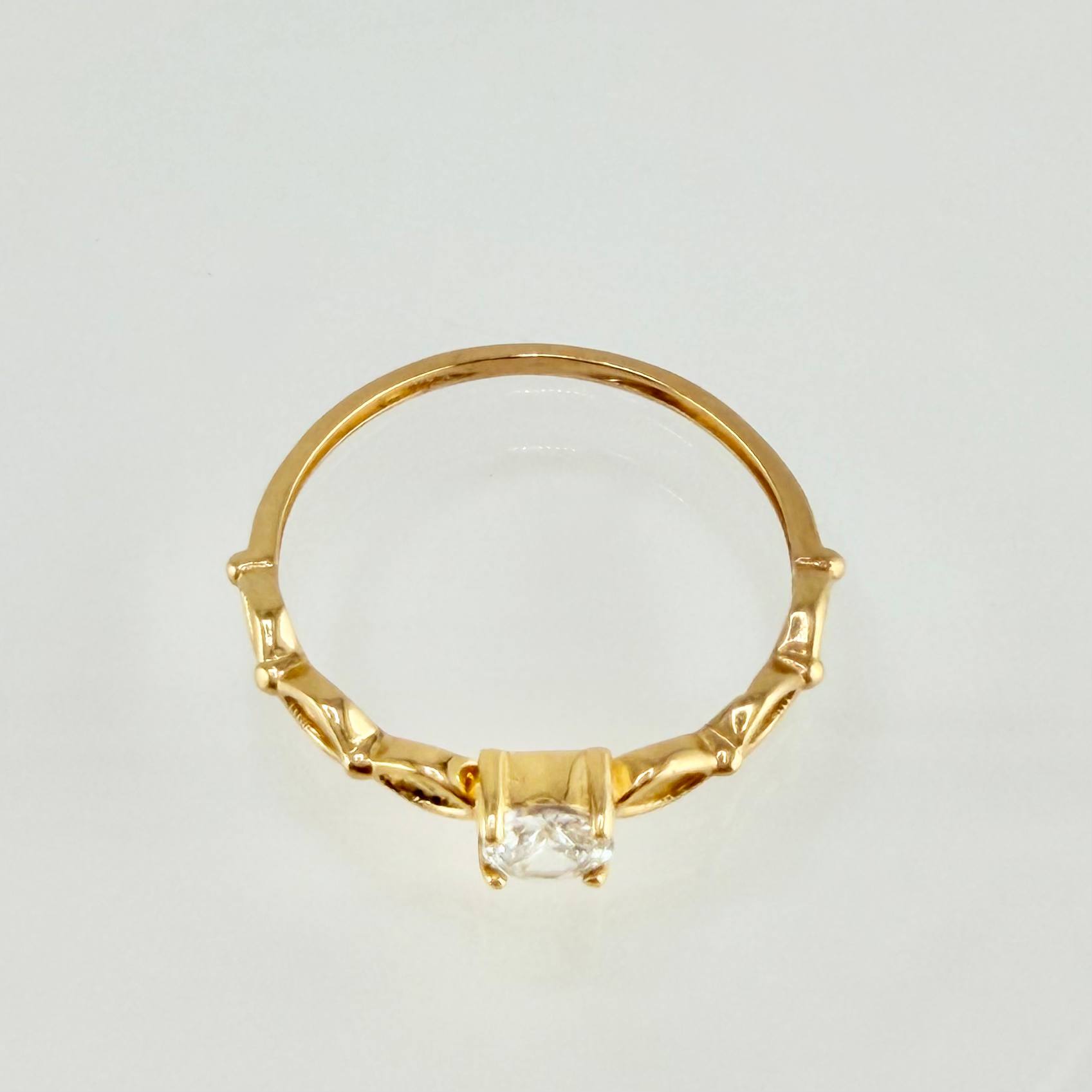 Anillo Solitario Ojos 1.15gr / T5 / Oro Amarillo 18K