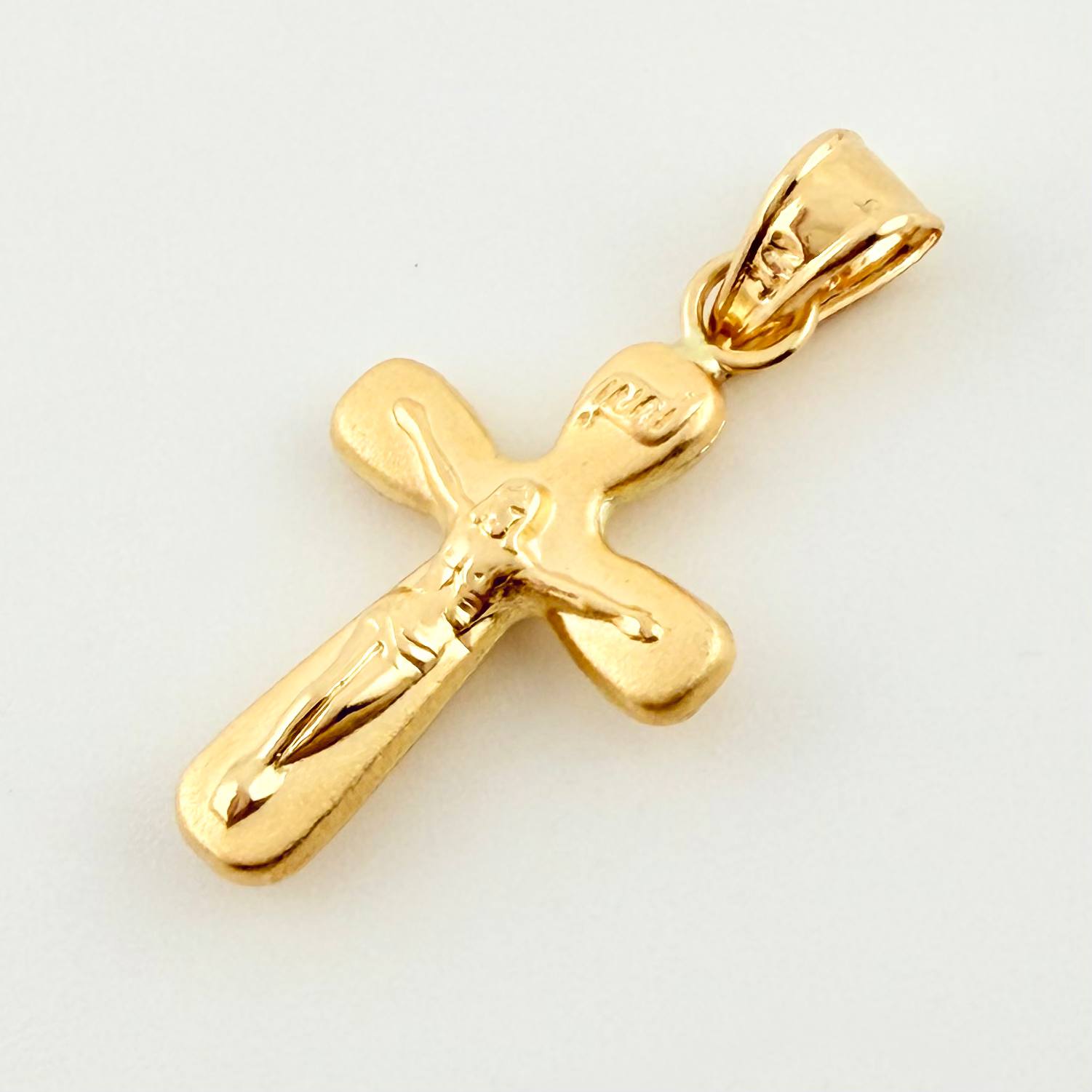 Dije Cruz Cristo 0.6gr / 1 in / Oro Amarillo 18K
