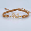 Pulsera Beige Herraje Familia 1.2gr / Oro 18K $