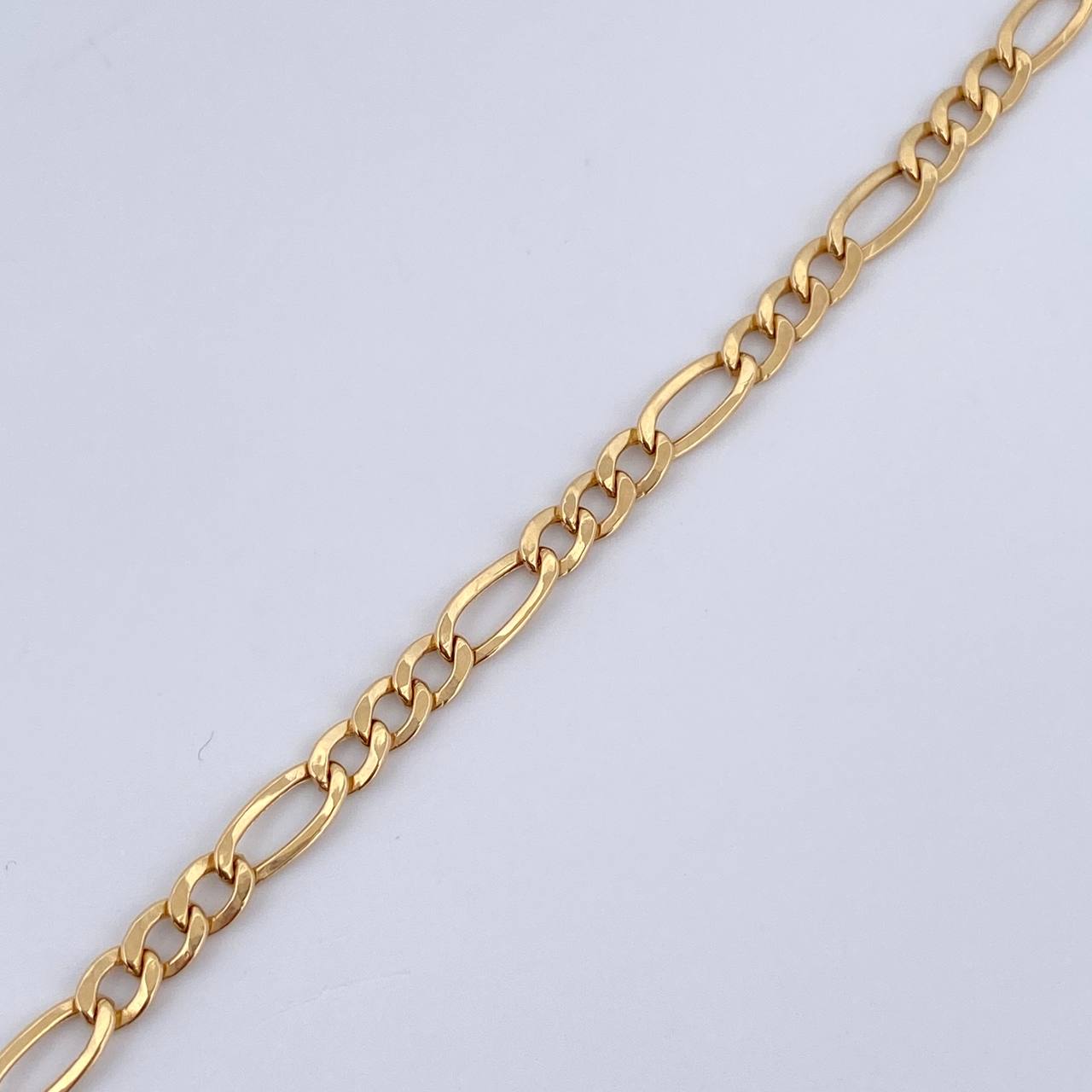 Figaro Bracelet 1.6gr / 7.7in / +1 18K Gold &