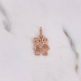 Dije Niño-Niña 1.65gr / 2.2cm / Circones Blancos Negros Oro Rosa 18K #