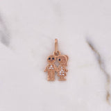 Dije Niño-Niña 1.65gr / 2.2cm / Circones Blancos Negros Oro Rosa 18K #