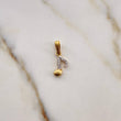 Dije Nota Musical 0.75gr / 1.7cm / Circones Blancos Dos Oros Amarillo Blanco 18K #