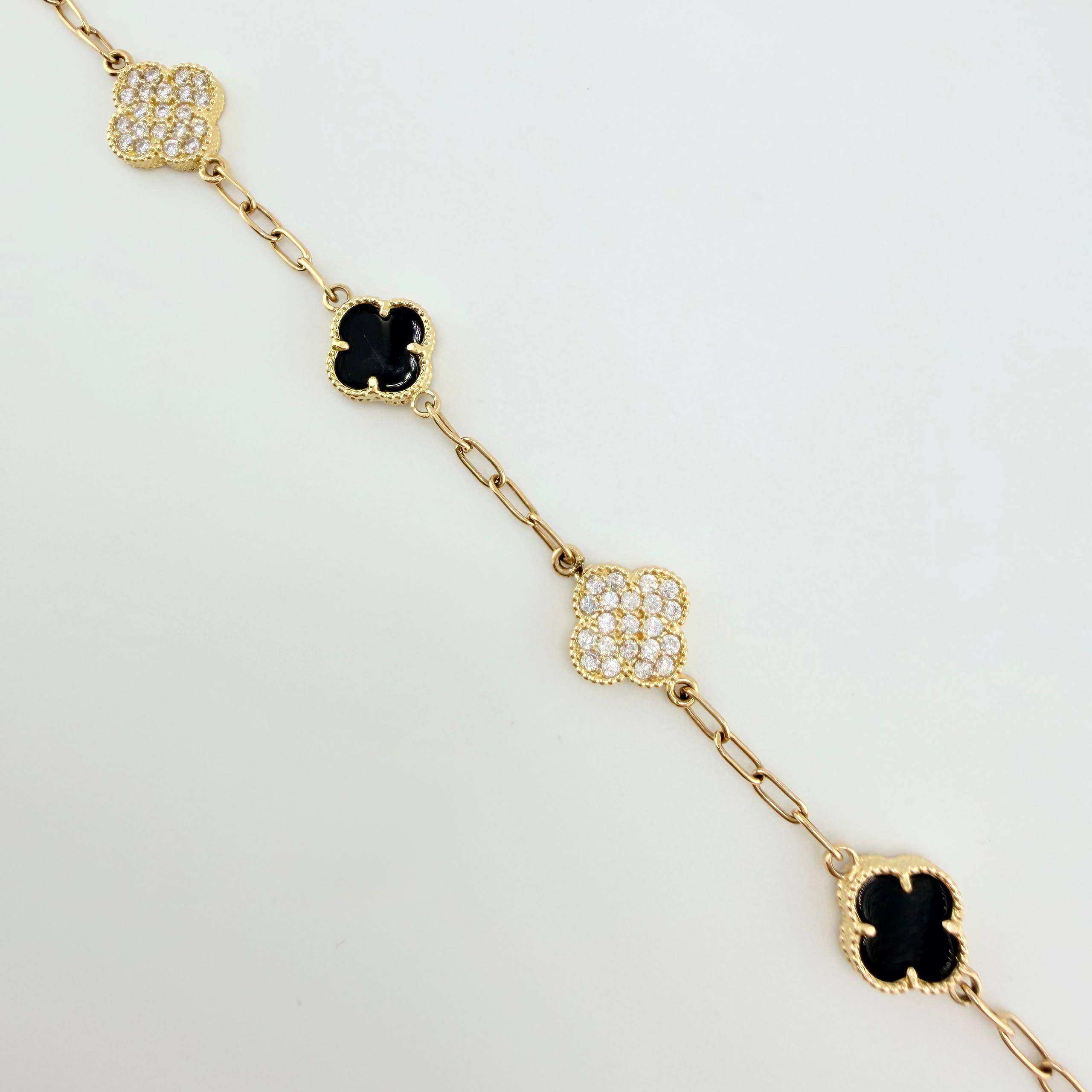 Pulso Trebol Onix Negro Circones Blancos 8gr / 7 in / 10.7mm Oro Amarillo Nac.Esp. 18K