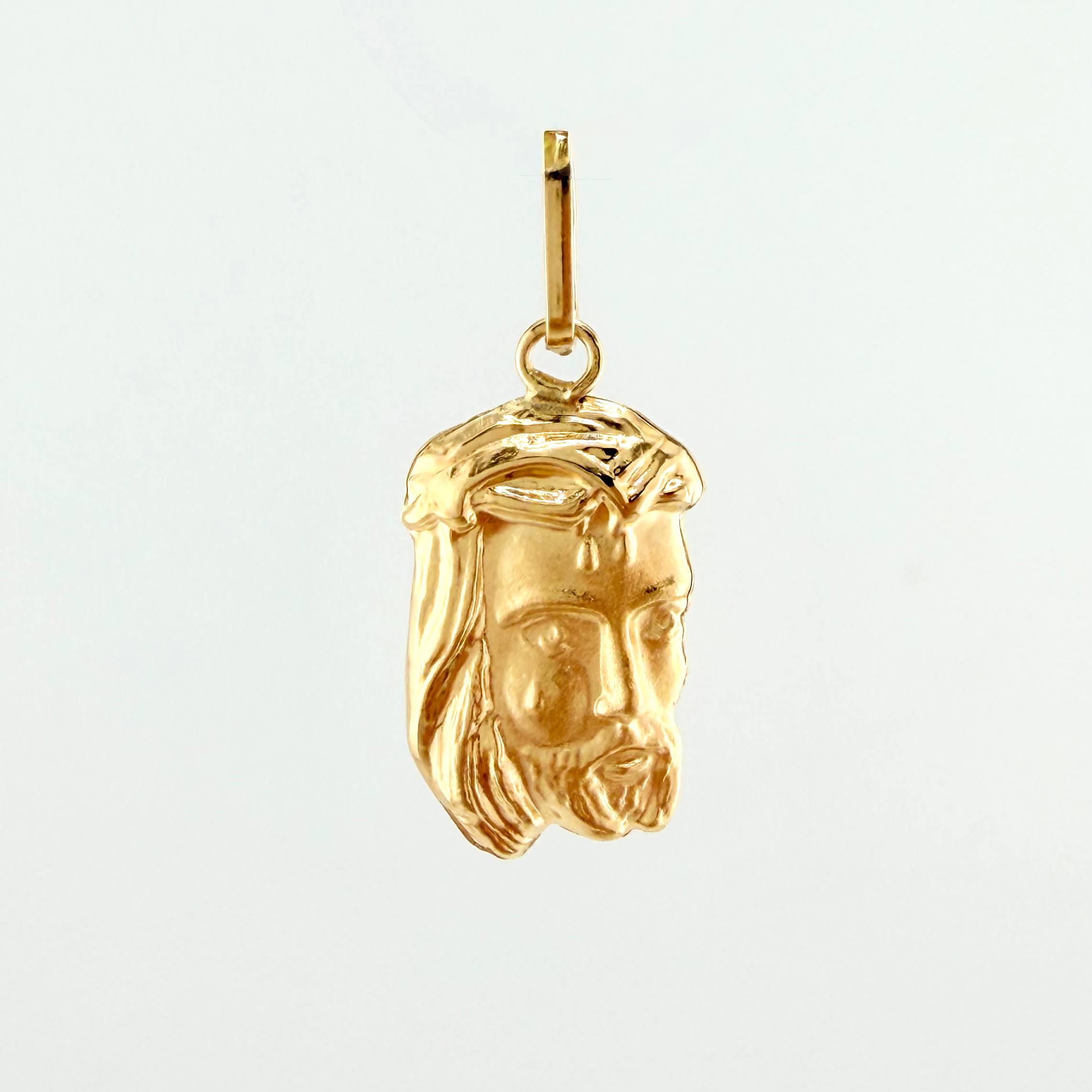 Dije Rostro Cristo 0.85gr / 1 in / Oro Amarillo 18K ©