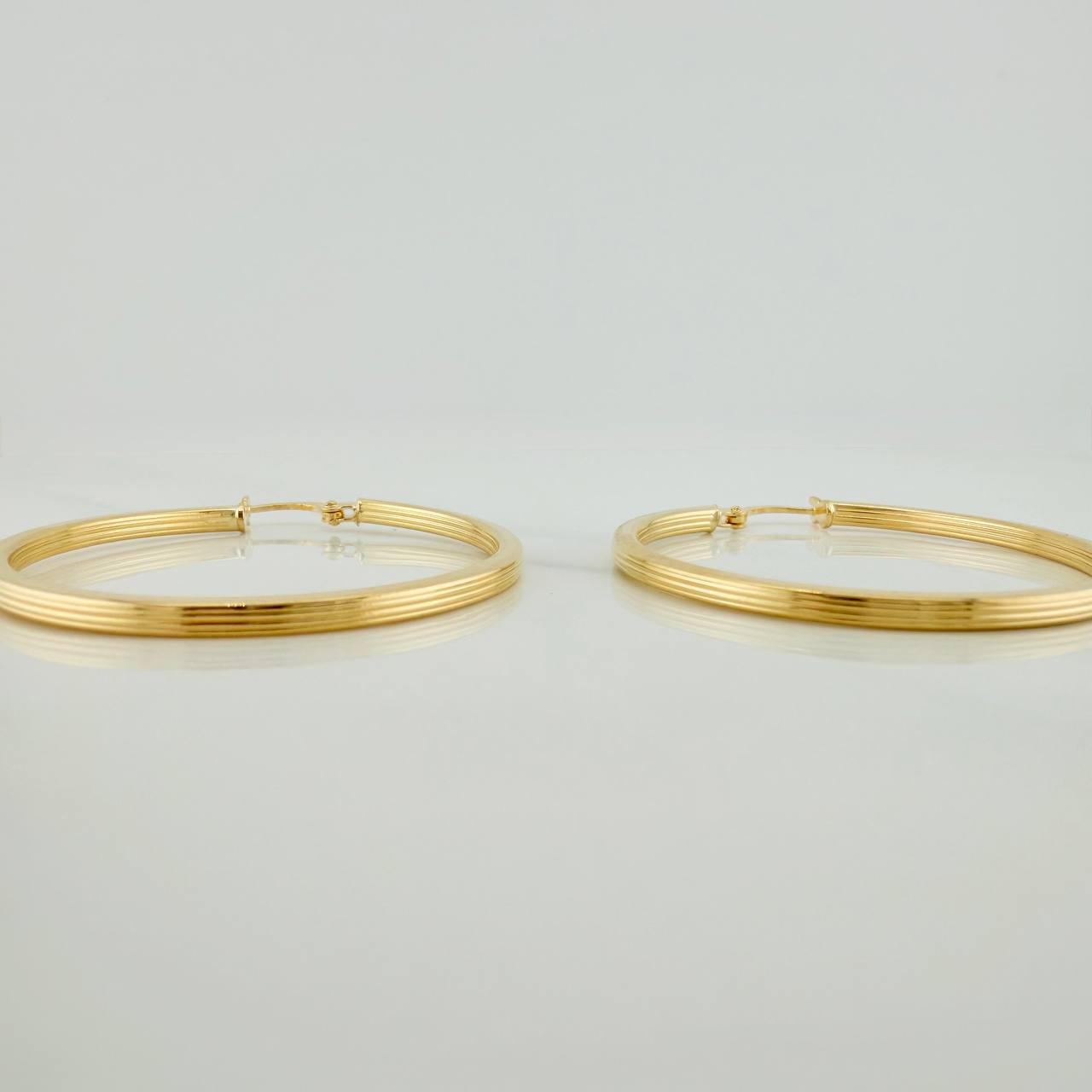Candongas Miku 2.3gr / 4cm / Oro Amarillo 18K $