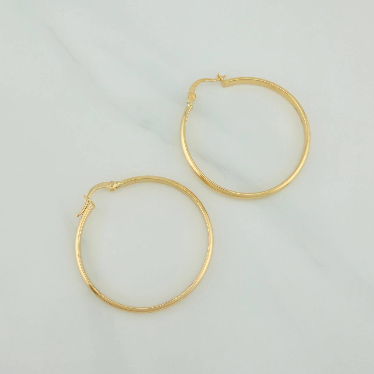 Candongas Nati 2.6gr / 3.7cm / Oro Amarillo 18K $