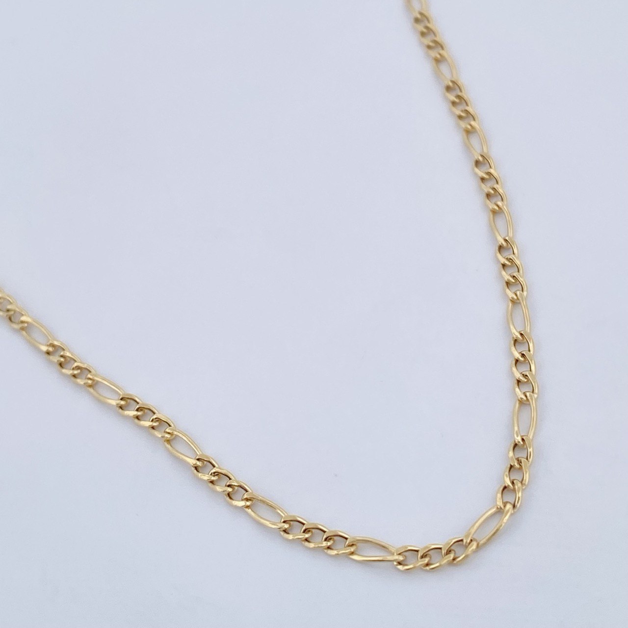 Figaro Chain 1.55gr / 19 3/4 in / 18K Gold +1 &
